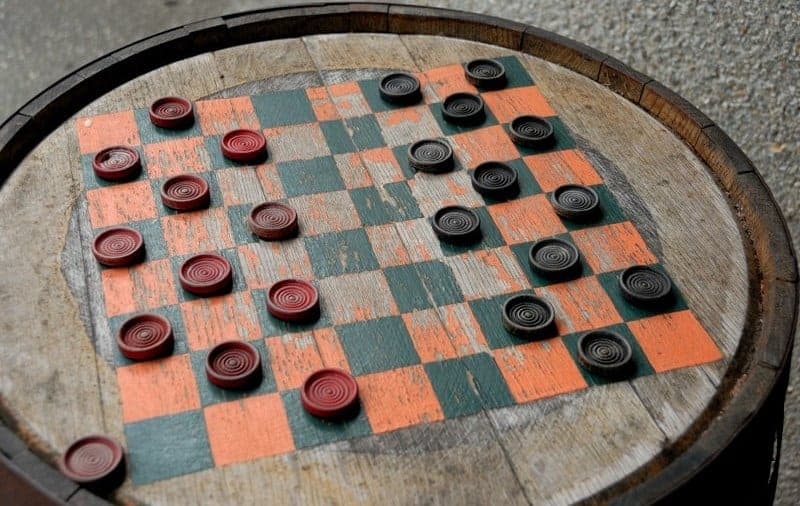 checkerboard type and chess draughts were first played on a barrel